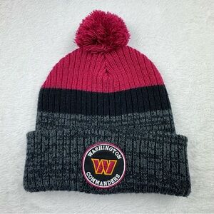 Washington Commanders New Era cuffed knit hat with a pom-pom